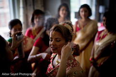 Stunning indian bride getting her hair done indian bride,indian bride getting ready,bridal jewelry