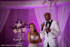 Fashionable indian groom giving a speech indian wedding reception,indian bride and groom