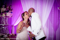 Heart melting indian bride and groom kissing indian wedding reception,indian bride and groom
