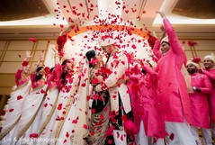 Magnificent indian bride and groom showered with rose petals indian wedding ceremony,indian bride fashion,indian groom fashion