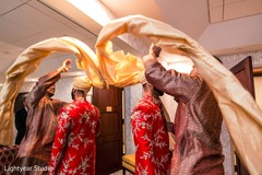 Glimpse of Indian groom getting ready.