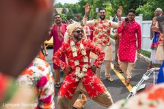 Indian groom dancing during the baraat. indian wedding procession,indian groom,baraat