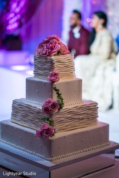Sweet four tier wedding cake. indian wedding reception,wedding cake,planning and design