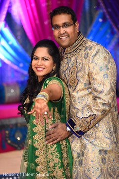 Delightful indian bride showing her engagement ring Delightful indian bride showing her engagement ring