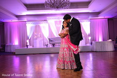 Lovely couple having their first dance indian wedding reception,indian bride and groom,dj and entertainment