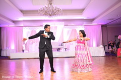 Dazzling indian newlywed couple dancing indian wedding reception,indian bride and groom,dj and entertainment