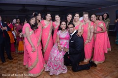 Indian bride and groom posing with bridesmaids indian wedding reception,indian bride and groom,indian bridesmaids fashion