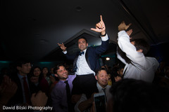 Elegant indian groom enjoying his wedding reception Elegant indian groom enjoying his wedding reception