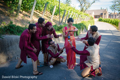 Indian bride posing with groomsmen indian bridal party,indian bride fashion,indian groomsmen fashion