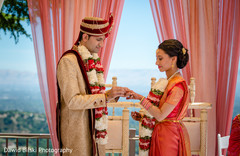 Traditional ring exchange moment indian wedding ceremony,indian groom fashion,indian bride fashion