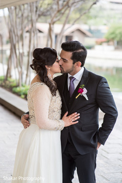Enchanting indian bride and groom kissing indian groom fashion,indian bride fashion,outdoor photography
