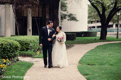 Dazzling indian bride walking with her father indian bride fashion,outdoor photography,indian bridal bouquet