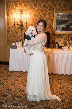 Beautiful indian bride posing with elegant dog indian bride portrait,indian bride fashion