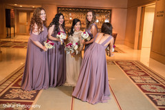 Cheerful indian bride with bridesmaids capture indian bridesmaids’ fashion,indian bride fashion,indian bridal bouquet