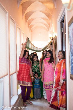 Indian bride making her entrance to mehndi party pre- wedding celebrations,mehndi party,indian bride fashion