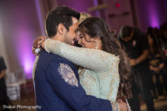 Gorgeous indian couple having their first dance indian bride and groom,indian wedding reception,dj and entertainment
