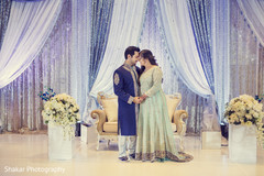 Heartwarming wedding reception scene indian bride and groom,indian wedding reception,reception station,indian wedding reception floral and decor