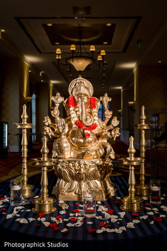 Indian wedding ceremony with a ganesh statue Indian wedding ceremony with a ganesh statue