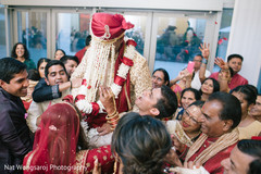 Indian groom during milni ritual indian wedding ceremony,milni ceremony,indian groom