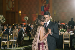 Charming indian bride and groom having their first dance indian wedding reception,indian groom fashion,indian bride fashion,dj and entertainment