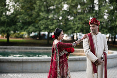 Charming indian bride and groom first look first look photography,indian bride fashion,indian bridal bouquet,indian groom