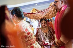 Lovely bride escorted to the mandap. Lovely bride escorted to the mandap.