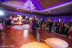 Unique Indian bride and groom entrance. indian bride and groom,indian wedding reception,rickshaw