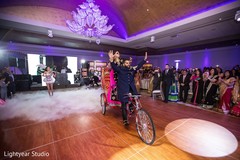 Newlyweds wedding reception stellar moments. indian bride and groom,indian wedding reception,rickshaw
