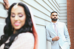 Elegant indian groom looking at bride indian bride fashion,indian groom fashion,outdoor photography