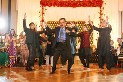 Indian bride's father making a dance performance indian wedding reception,indian wedding reception photography,dj and entertainment