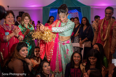 Indian bride during sangeet celebration Indian bride during sangeet celebration