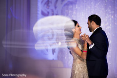 Heart melting couple having their first dance indian wedding reception,indian bride and groom,lightning,first dance