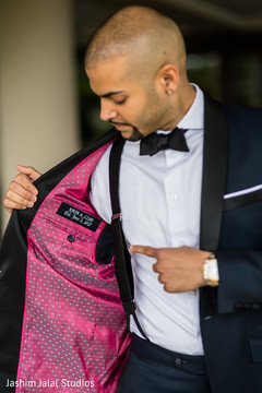 Indian groom candid capture. indian groom,tux,getting ready