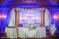 Over the top indian wedding reception. floral and decor,indian wedding reception,wedding cake