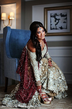 Indian bride glowing in her wedding attire. Indian bride glowing in her wedding attire.