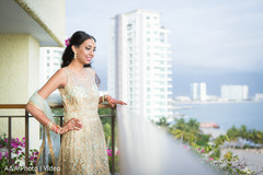 Adorable indian bride looking at the beach Adorable indian bride looking at the beach