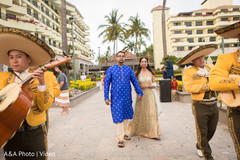 Sweet indian couple walking holding hands Sweet indian couple walking holding hands