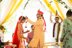 Indian bride and groom's jai mala ceremony indian wedding ceremony,indian wedding ceremony photography,indian brides and groom,jai mala ceremony