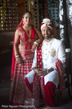 Glamorous indian couple photo shoot indian groom fashion,indian bride lengha,bridal jewelry
