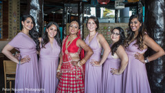 Indian bride posing with bridesmaids bridal jewelry,indian bride lengha,indian bridesmaids’ fashion,indian bridal party