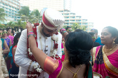 Indian groom during milni indian wedding ceremony,milni ceremony,indian groom fashion