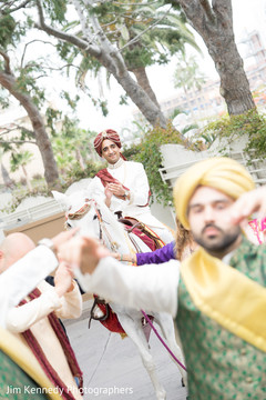 Groom riding the traditional baraat horse. baraat,indian groom,baraat horse