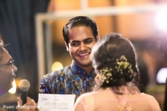 Indian bride and groom at their wedding reception indian wedding reception,pre-wedding reception photography,indian bride and groom