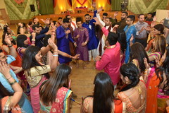 Vibrant Garba celebration. pre-wedding celebration,garba,dandiya sticks,dj