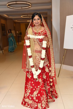 Classic Indian bridal look. indian bride,bridal lehenga,flower garland