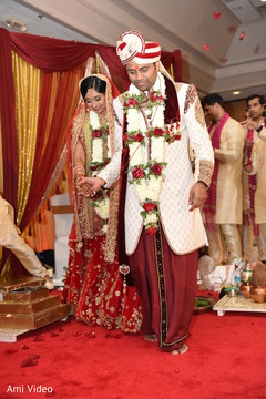 Indian bride and groom going around the sacred fire. indian bride and groom,indian wedding ceremony,mandap