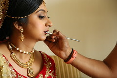 Indian bride makeup session. indian bridal makeup,bridal jewelry,getting ready,bridal fashion