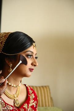 Maharani being dolled up for her big day. indian bridal makeup,bridal jewelry,getting ready