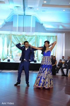 Indian couple jubilant dance performance. indian wedding reception,dj,choreography