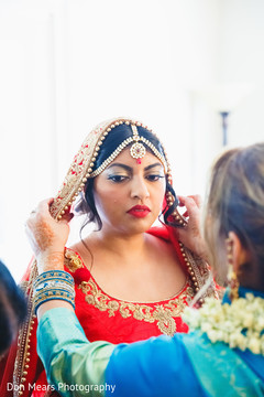 Indian bride getting ready red lengha,bridal fashion,indian bride jewelry